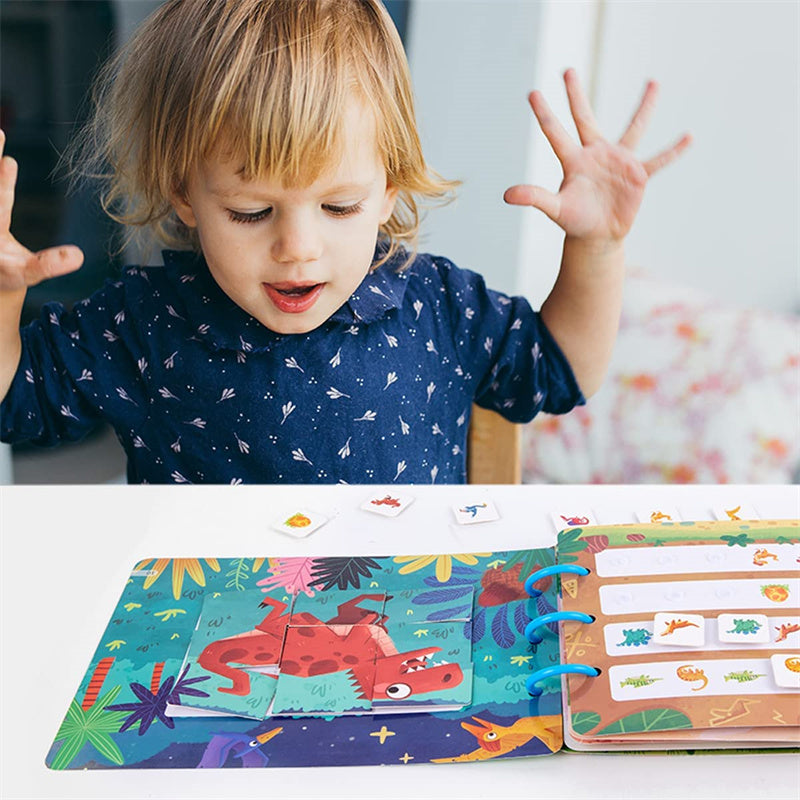 Child exploring dinosaur illustrations and matching activities in an open book