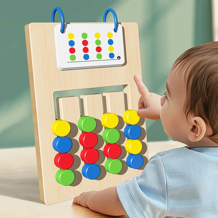 Child exploring a wooden sorting board with colored pieces and a matching pattern card.