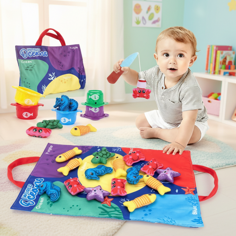 Child holding a toy fishing rod over plush sea creatures on the unfolded play mat