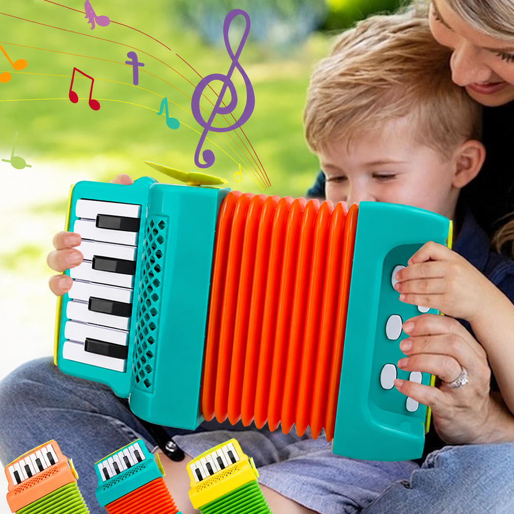 Child playing a green toy accordion with an adult's help