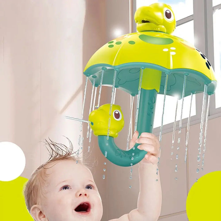 Child holding a dinosaur umbrella bath toy as water falls from its edges