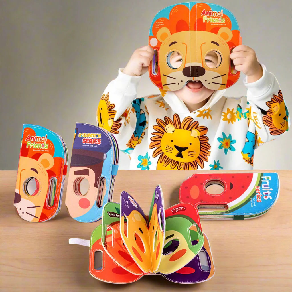 Child holding a lion-face cloth book with fruit and profession books on the table.