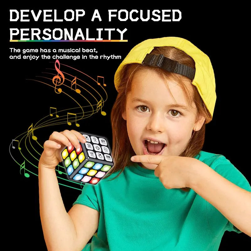 Child holding a light-up activity cube with colorful buttons