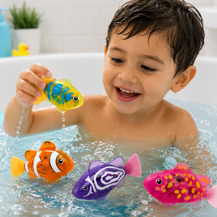 Child holding a yellow-and-blue fish bath toy with three other fish designs in the tub