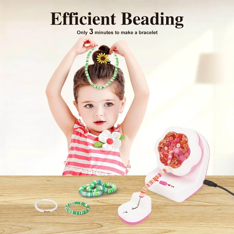 Child holding a beaded necklace above a table with the electric beading machine and bracelets.