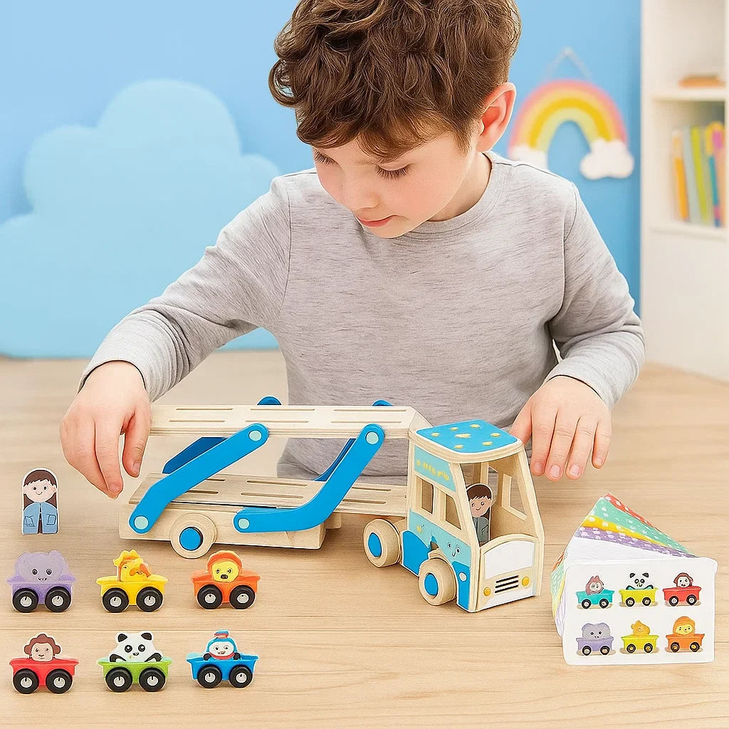 Child arranging animal vehicles beside a blue wooden carrier truck and matching cards.