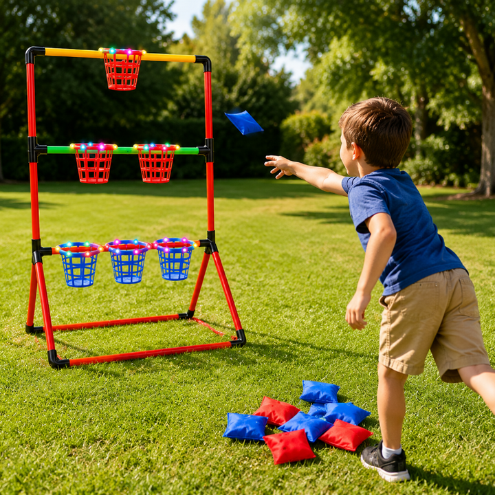 Child tossing a blue beanbag toward a three-level basket target frame on a lawn.