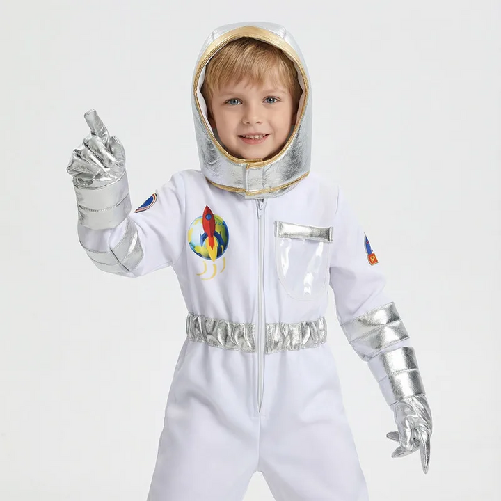 Child wearing a white astronaut jumpsuit with a separate hood and silver-colored gloves.