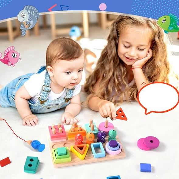Two children exploring a wooden fishing board with colorful fish and stacking shapes