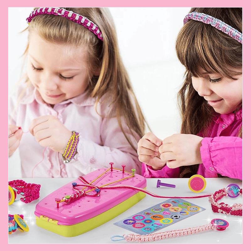 Two children making colorful jewelry together at a craft table