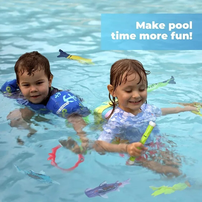Two children playing in a pool with colorful diving toys