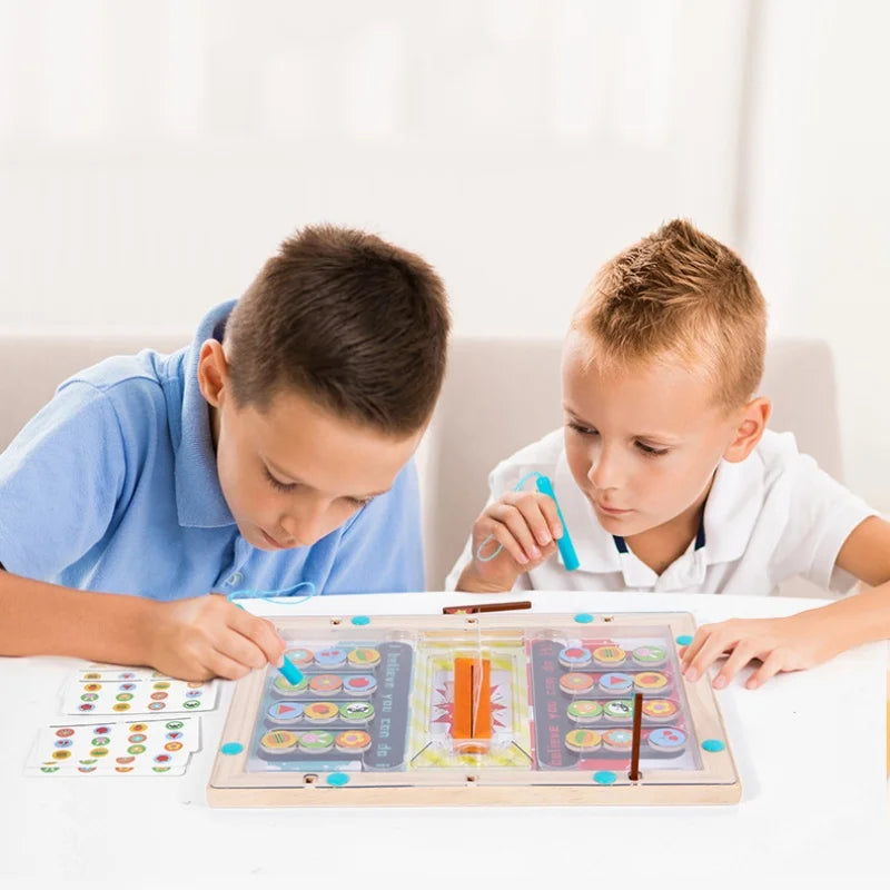 Two children use magnetic wands to match colors on a wooden game board.