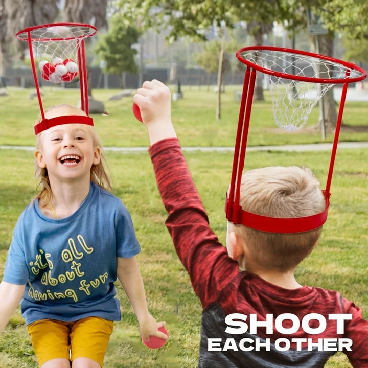 Two children playing outdoors with red headband basketball hoops and red and white balls