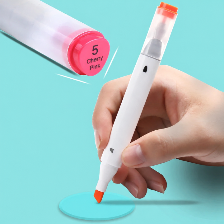 Hand holding a chisel-tip marker beside a close-up of a pink color-coded cap