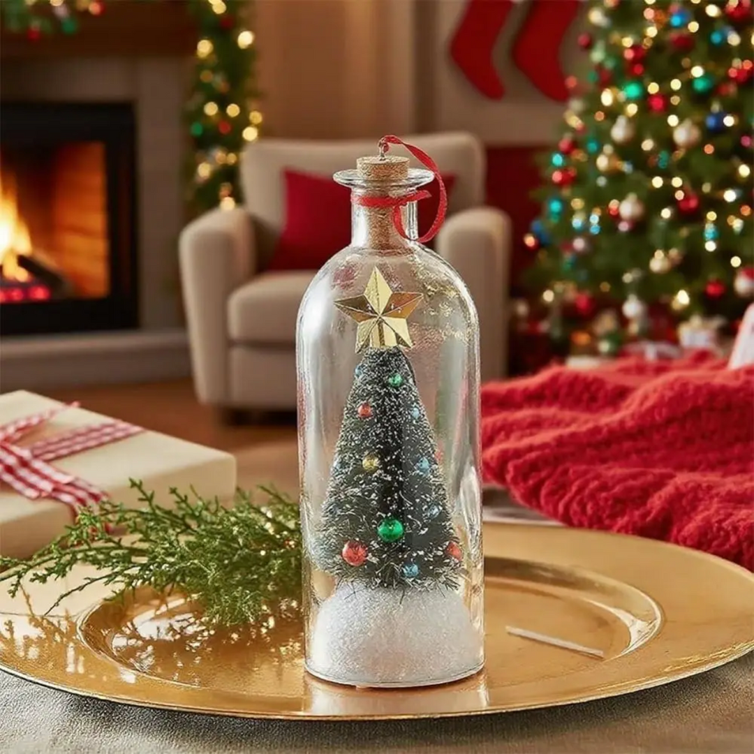 Christmas tree bottle ornament displayed on a gold tray in a festive living room