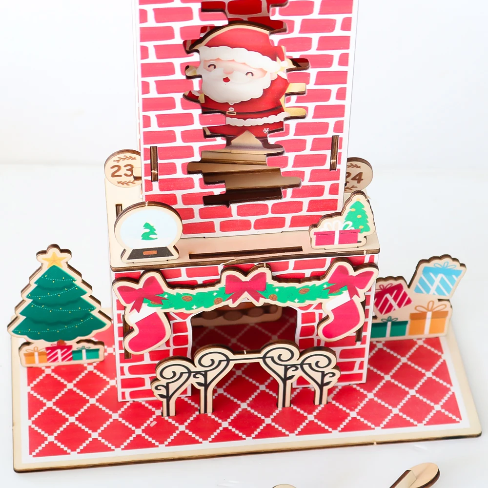 Christmas countdown calendar base with a fireplace, tree, presents, and Santa above
