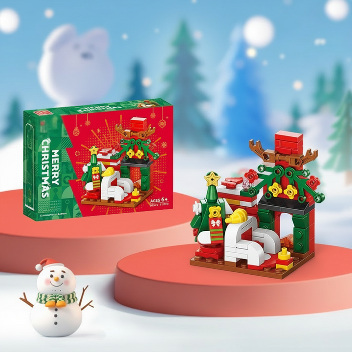 Christmas living room building model with an armchair and festive decorations beside its box