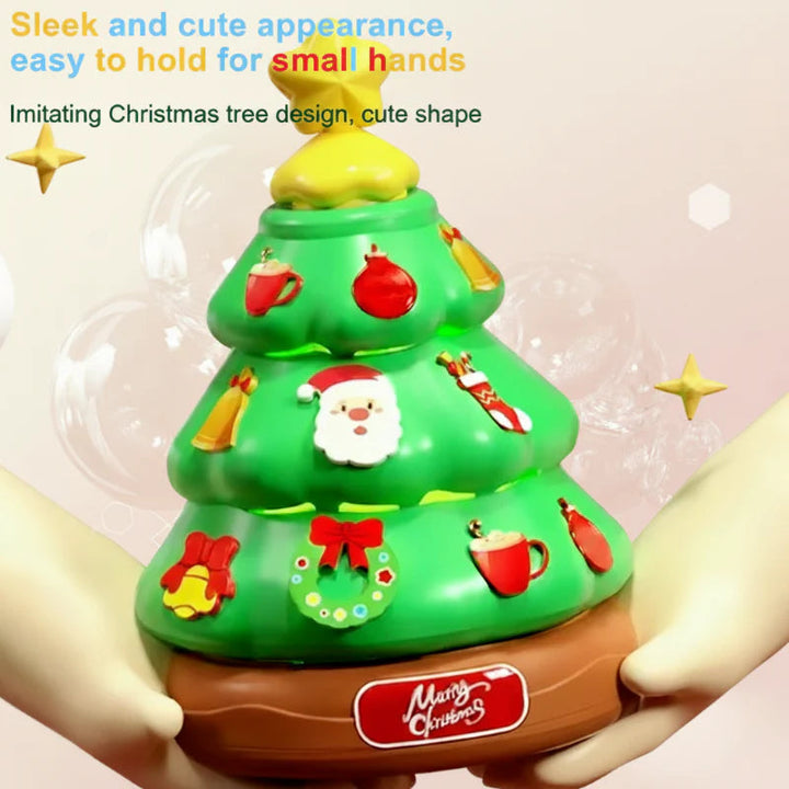 Christmas tree bubble machine held between two hands, with green branches and a brown base