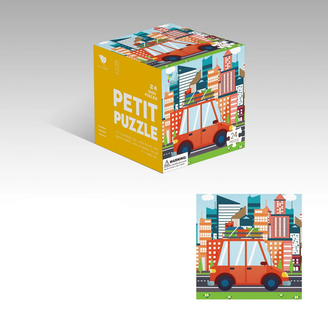 Car jigsaw puzzle showing a city street and a matching cube box
