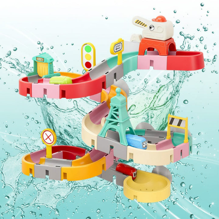City bath toy with a winding slide, road signs, a tower, and colorful track sections