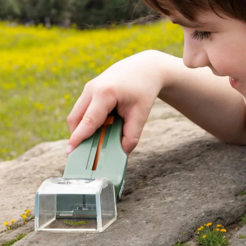 Child positioning the bug catcher&
