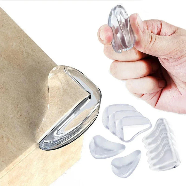 Clear corner protector on a wood-toned tabletop, with loose covers and a hand holding another cover