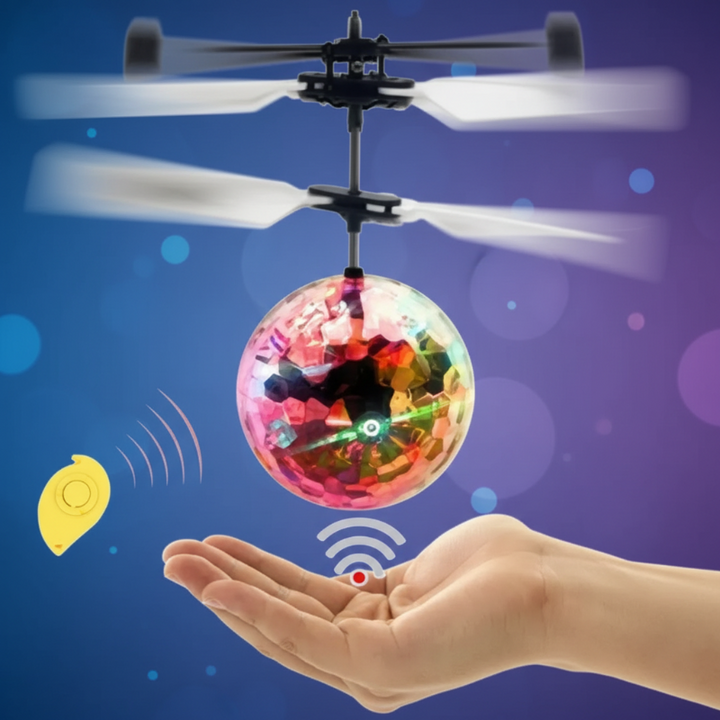 Clear LED flying ball above two hands, shown with a yellow remote