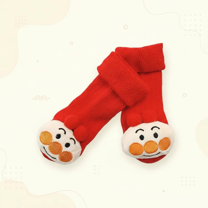 Red socks with clown face details and ribbed cuffs