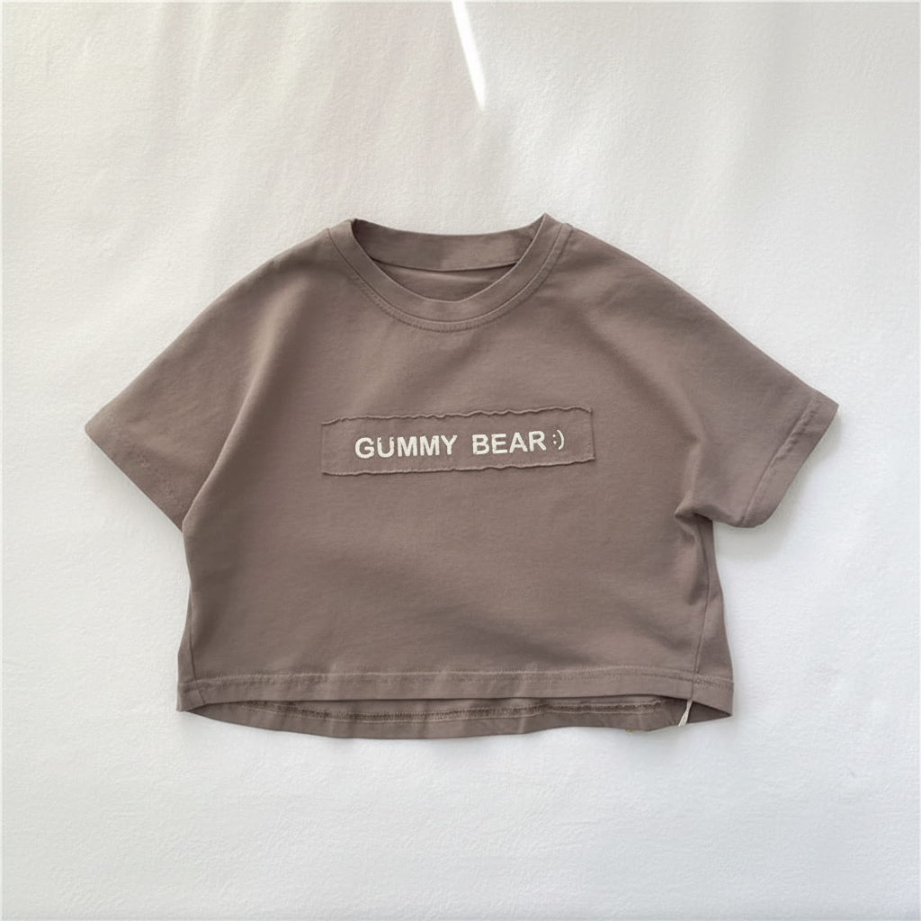 Front view of the Coffee T-shirt showing short sleeves and Gummy Bear lettering