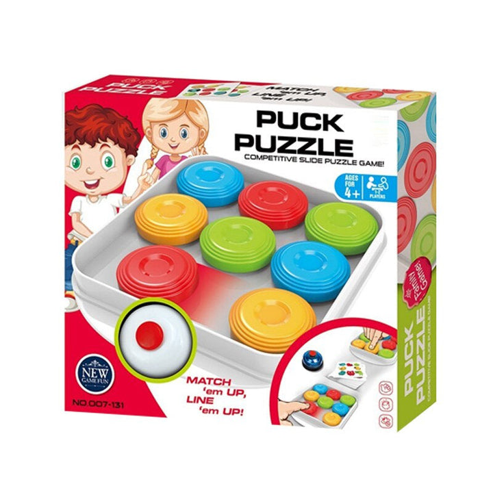 Boxed sliding-disk puzzle game with colorful disks and a bell pictured on the front