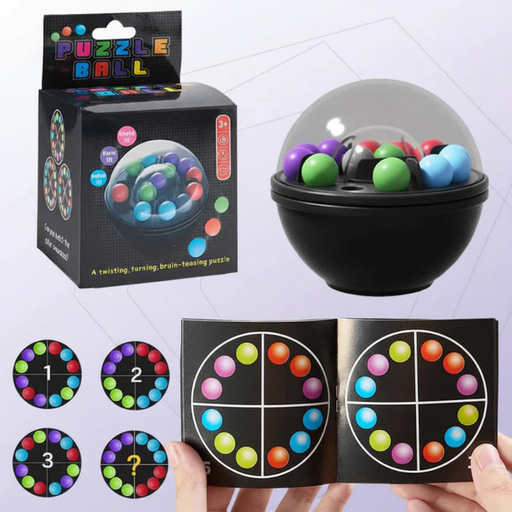 Color-matching puzzle ball with a clear dome, challenge booklet and product box