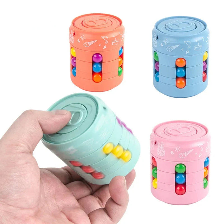 Blue, green, orange, and pink fidget puzzles with colorful beads, with a green puzzle held in one hand