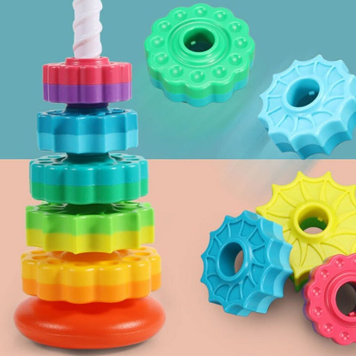 Colorful stacking discs on a spiral post with loose discs showing different shapes