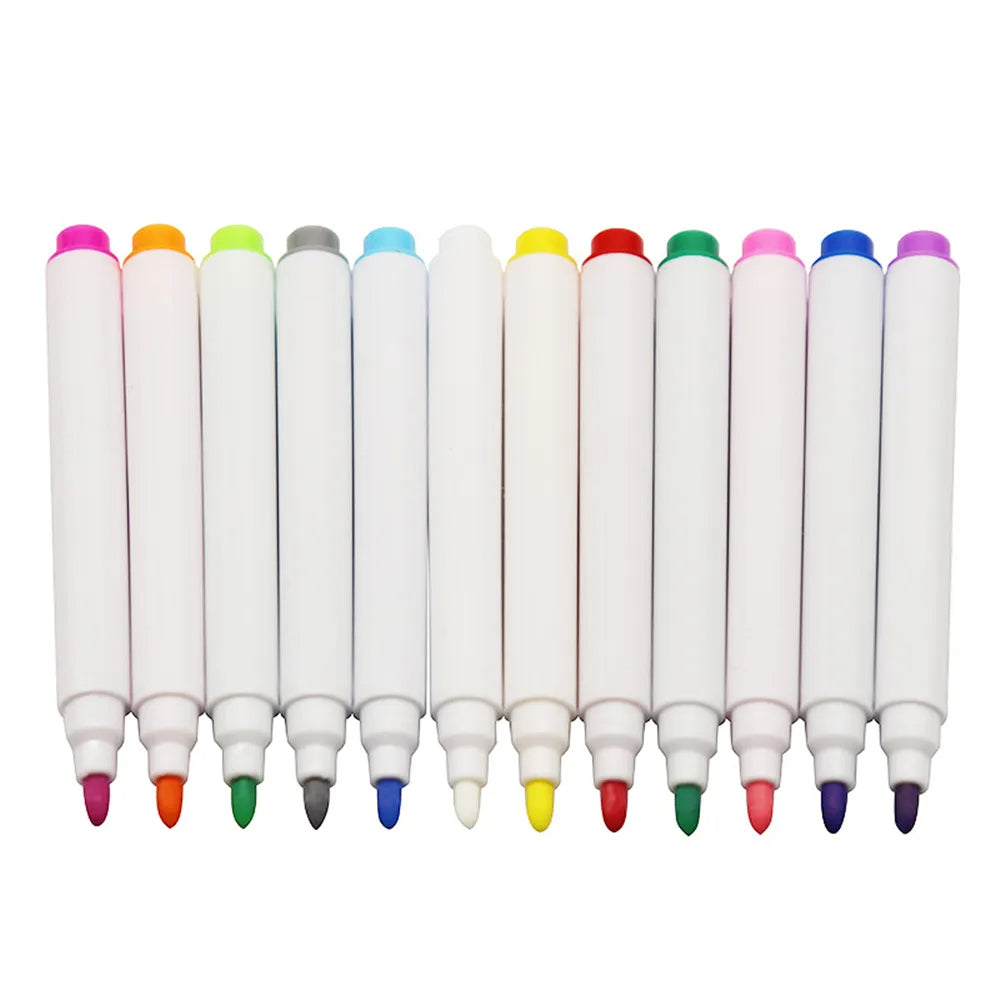 Drawing pens with exposed colored tips arranged in a row