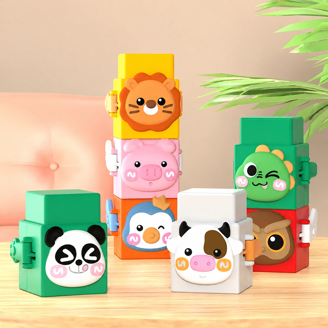 Animal blocks arranged on a tabletop, including a panda, cow, lion, and crocodile.