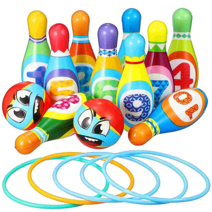 Colorful numbered bowling pins, two cartoon-face bowling balls, and five rings