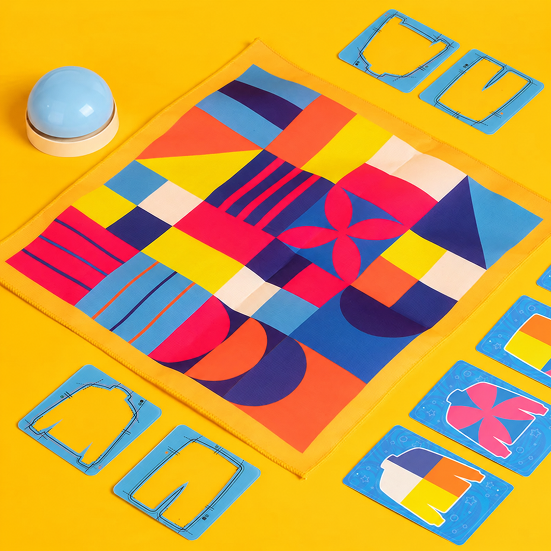 Patterned fabric board with shirt and pants card frames, goal cards, and a blue bell.