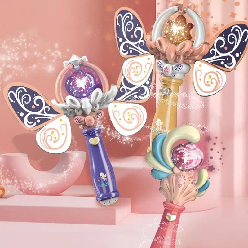 Pink, purple, and yellow toy wands with glowing centers and decorative tops