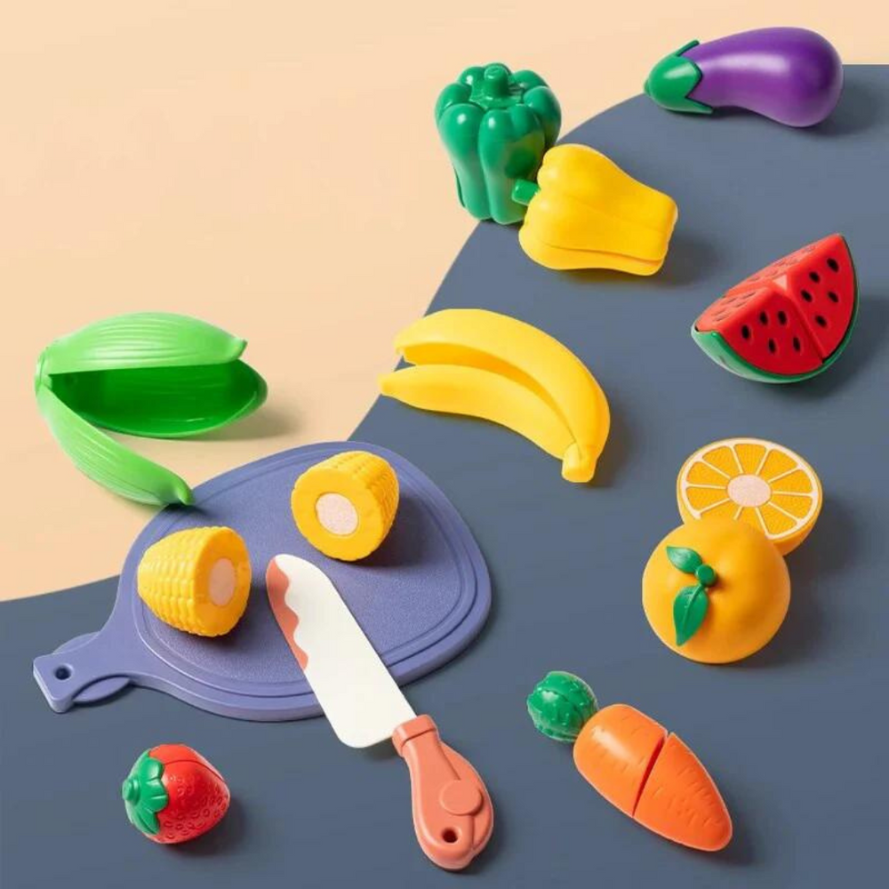 Fruit cutting play set with separable corn, carrot, orange, and other colorful play food