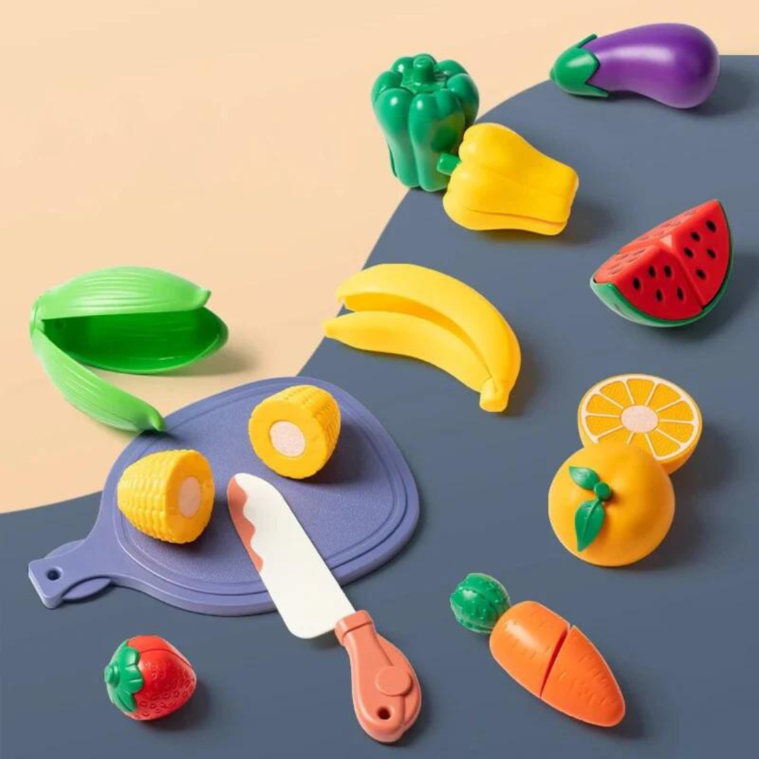 Fruit cutting play set with separable corn, carrot, orange, and other colorful play food