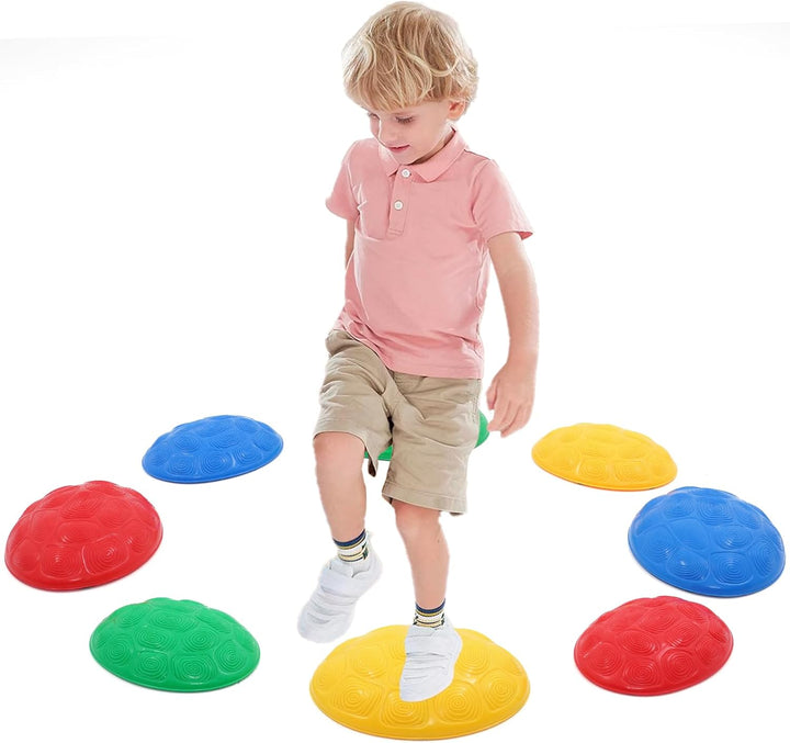 Child stepping onto a yellow balance stone in a circle of colorful textured stones