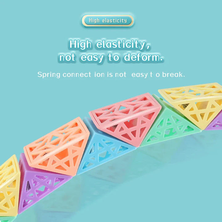 Close-up of linked pastel building segments with open lattice sides