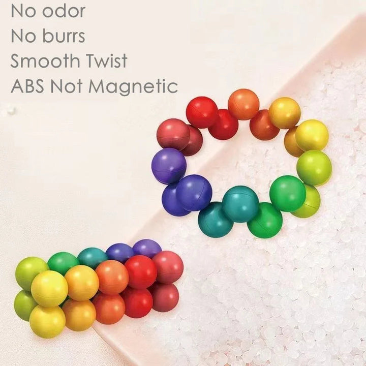 Multicolored connected puzzle balls arranged in an open ring and a folded row