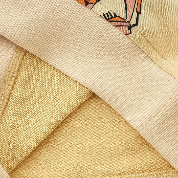 Folded sweatshirt showing the inside fabric and ribbed edge