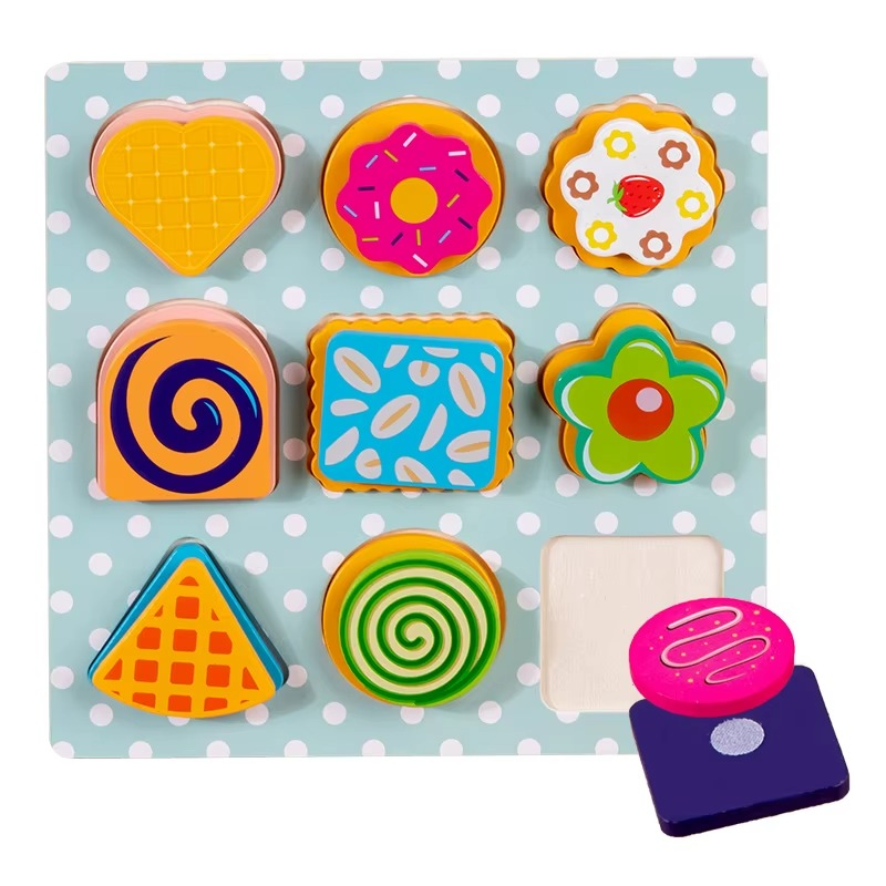 Wooden cookie board with colorful matching shapes and one cookie lifted from its space