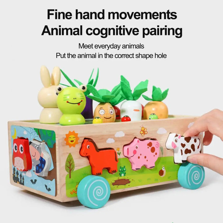 Hand matching a cow-shaped block to an opening in the side of a wooden farm wagon