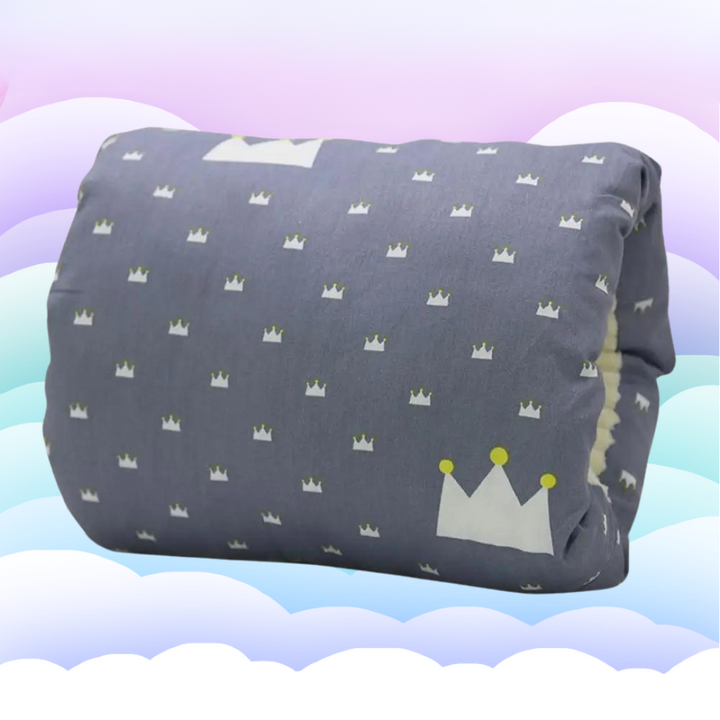 Gray nursing pillow with small crown motifs and a larger crown accent.