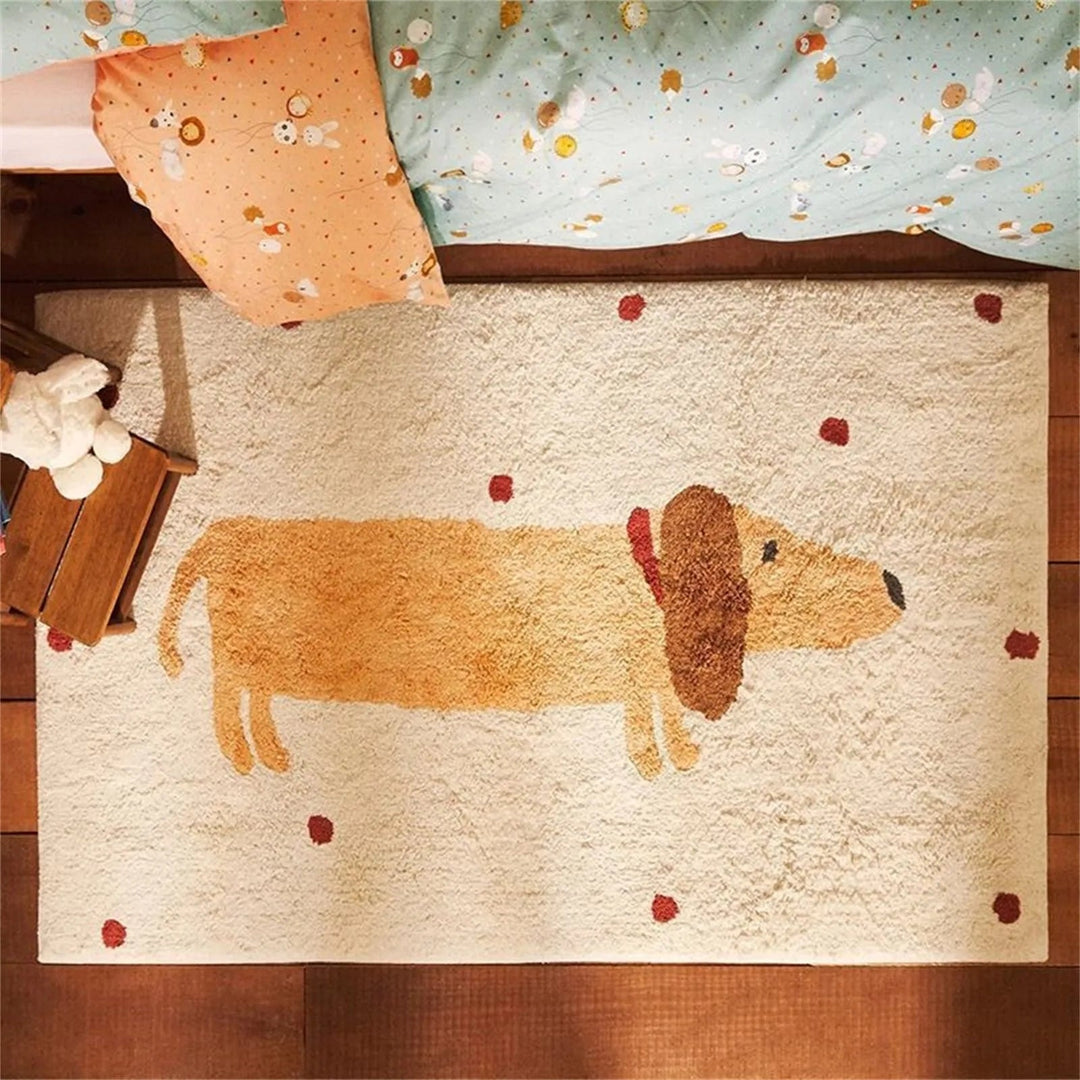 Beige dachshund rug with red dots placed beside a bed on a wood floor
