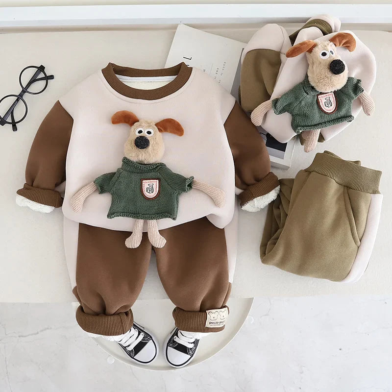 Brown puppy-detail sweater and pants with the green option displayed alongside