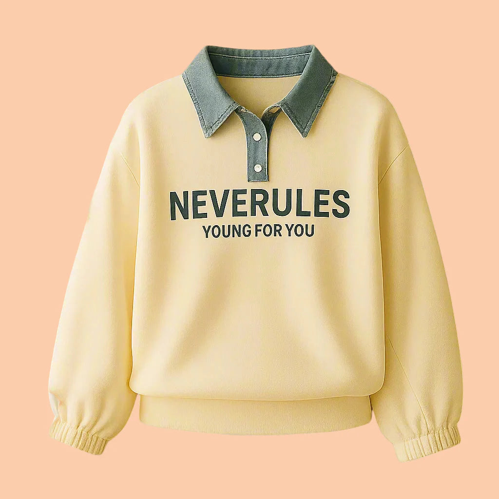 Cream long-sleeve polo shirt with a blue denim collar, button placket, and printed chest lettering
